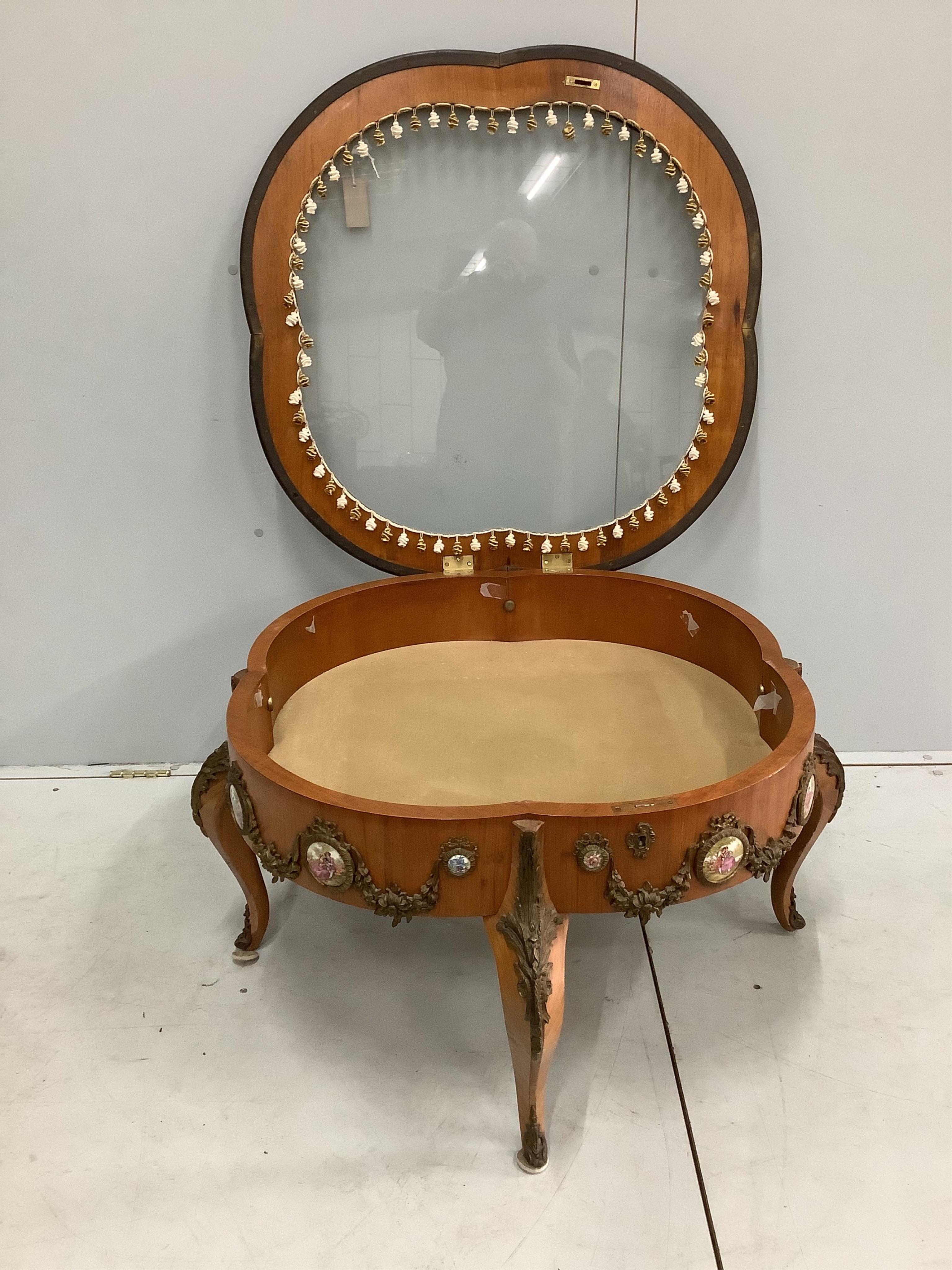 A French gilt metal mounted kingwood bijouterie table, width 95cm, height 48cm